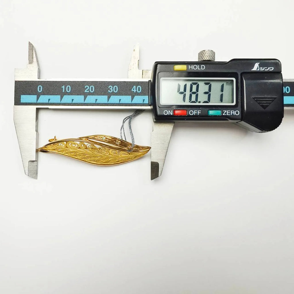 ダイヤモンド　ブローチ　ゴールド　K18